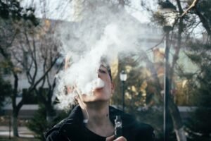 photography-of-a-man-using-vape